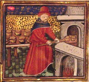 Man baking bread in medieval Europe