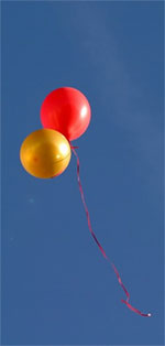 balloons floating in the sky