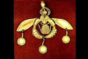 gold in the shape of a bee