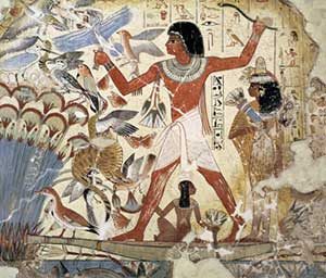 Egyptian wall painting of a brown-skinned man hunting a flock of birds in long grass by the river