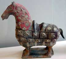 a painted horse in clay
