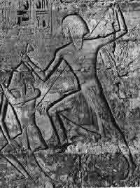 Ramses III killing a Libyan (New Kingdom)