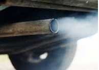 Car tailpipe shooting out carbon