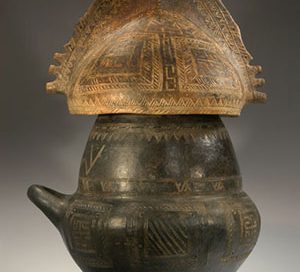Villanovan cremation urn with helmet on top (ca. 900 BC)