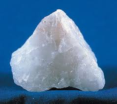 What is quartz? A chunk of white quartz, slightly transluscent and irregular