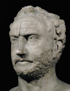 Thucydides: a stone bust of a middle-aged white man with a short beard