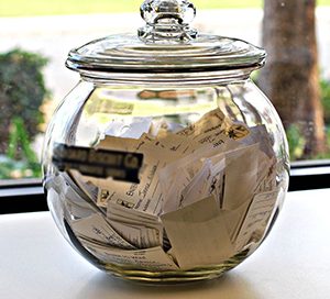 A shiny silver jar