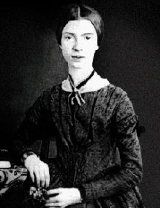 Emily Dickinson - a white woman in a dark dress looking serious