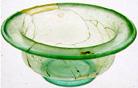 Roman glass bowl - the Roman economy produced a lot of glass to sell within the Roman Empire and internationally