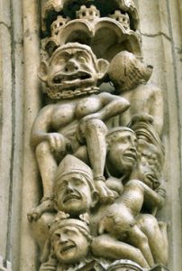 A demon torturing a sinful bishop and a king(Notre Dame Cathedral, Paris, 1200s)