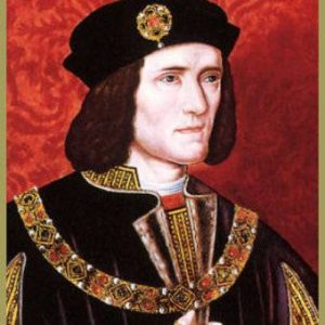 Richard III: a white man with brown hair and a black cap