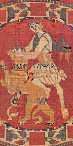 Samson (or David?) wrestles the lion. Silk tapestry, probably from Syria, in the 600s AD