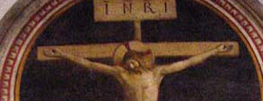 Jesus on the Cross, by Fra Angelico. He has nails through his hands.