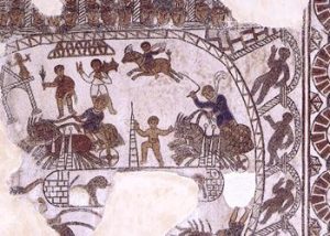 A mosaic from the 500s AD in Gafsa (North Africa), now in the Bardo Museum Can you see the people sitting in the stands? The central posts to turn around?The charioteers whipping the horses?